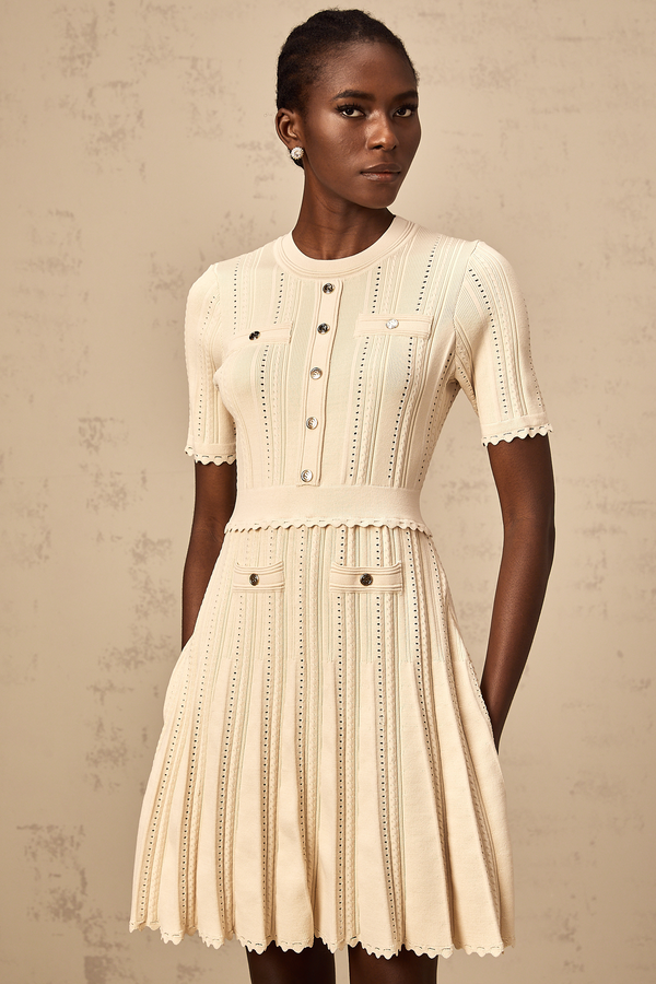 Amélie neutrals pointelle-trim pleated knit mini dress